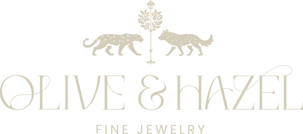 Logo of Olive & Hazel Fine Jewelry with stylized animals and leaves on a white background